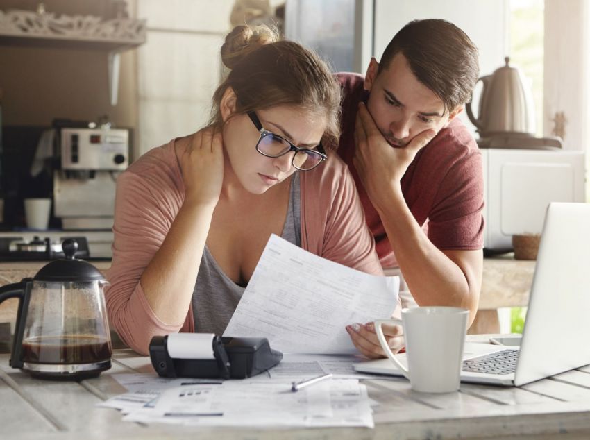 young caucasian family having debt problems